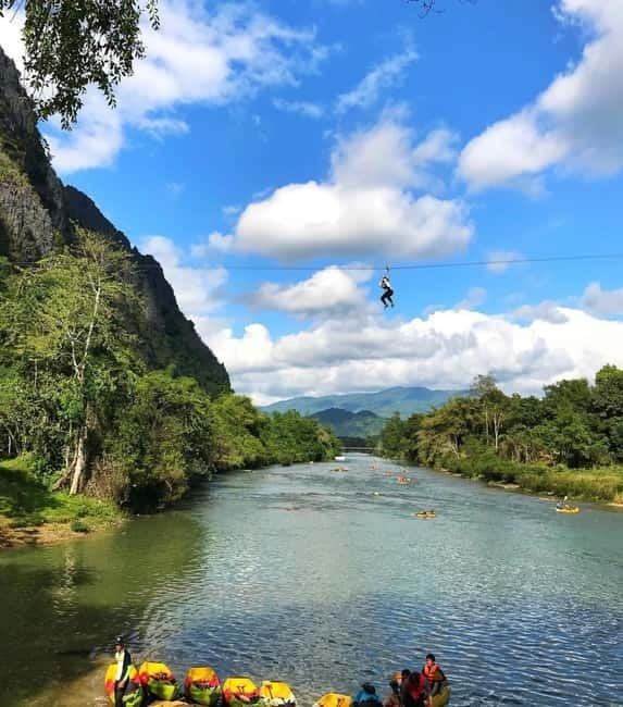 From Vientiane: Vang Vieng Tour with Cave Kayak & Zipline - Entering Vang Vieng by water first, not by hype