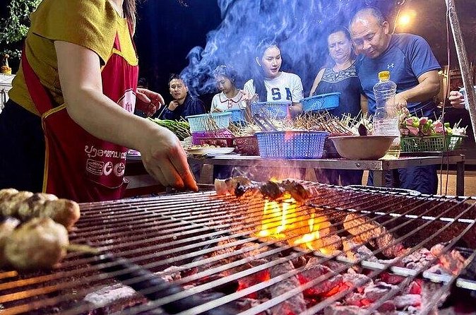Luang Prabang Evening Food Tour by Tuk-Tuk - The BBQ stop where you grill your own Lao dinner