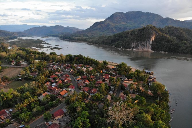 Luang Prabang Mountain Bike Cycling Tour - Pak Ou Caves: the boat transition that breaks up the day
