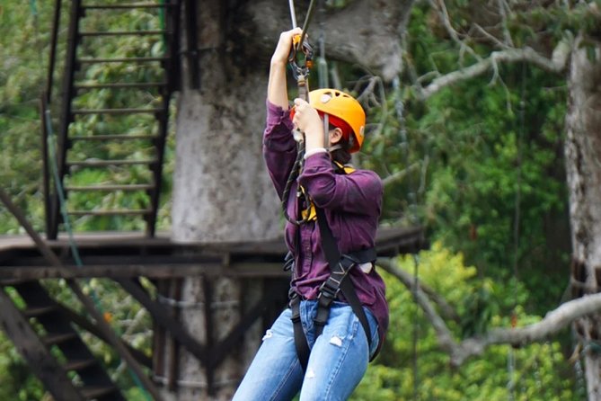 One Day Guided Tour: Kayaking, Zipline & Tubing In The Cave from Vang Vieng - Switching From Caves to Heights: Ziplining Through the Forest
