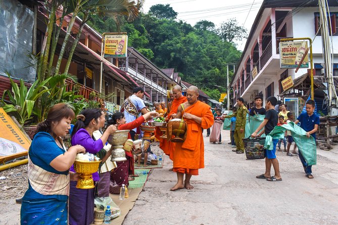 Private Tour: Half-Day City Tour of Luang Prabang - Wat Xiengthong: classical Laotian architecture in sweeping tiered roofs