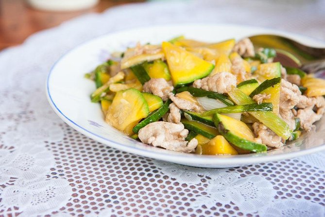 Traditional Market Tour and Private Laotian Cooking Class with a Local - Inside the home kitchen: cooking 2 to 3 Lao dishes and eating together