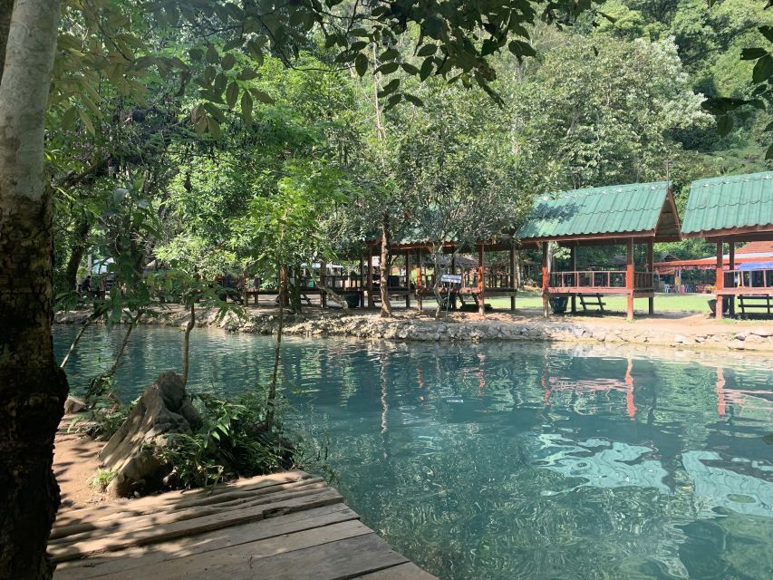 Vang Vieng: Kayaking & Cave Tubing with Zip Line/Blue Lagoon - Tham Norn Sleeping Cave tubing: torches, tight turns, and war stories