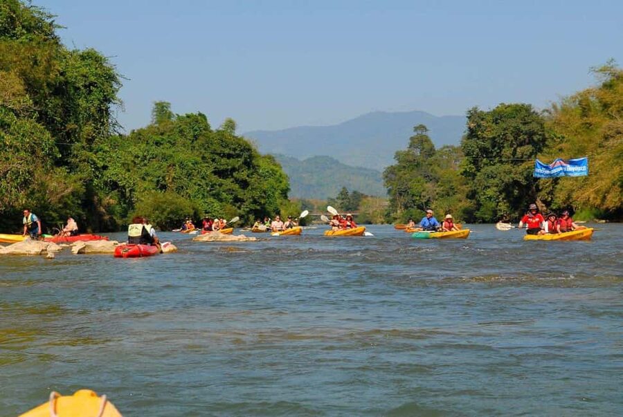 Vang Vieng: Kayaking&Water Cave&Tham Chang&Blue Lagoon 1 - The rapid shift to rafting and the Tham Chang Underwater Cave tire ride