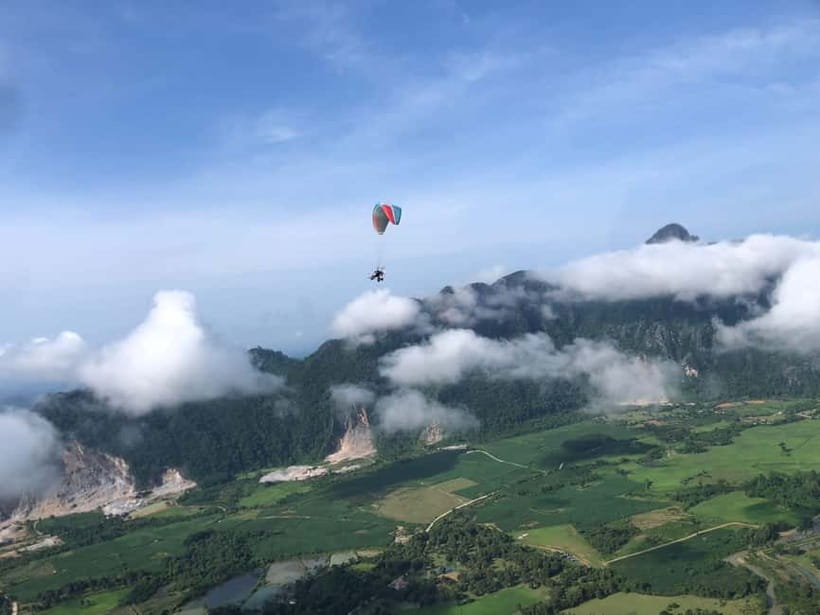 Vang Vieng: Paragliding Experience with Hotel Pickup - Picking Morning or Afternoon Flights, 15 Minutes Up in the Sky