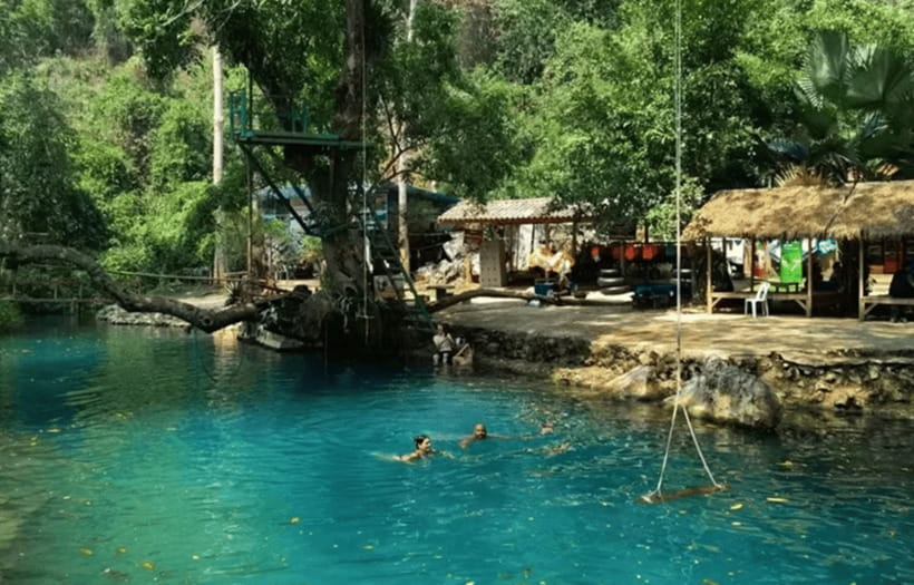 Vang Vieng:Zipline,Water Cave,Tham Chang,Kayak,Blue Lagoon 3 - Tham Chang Underwater Cave Tire Rafting, Ropes, Cool Water, and Controlled Chaos