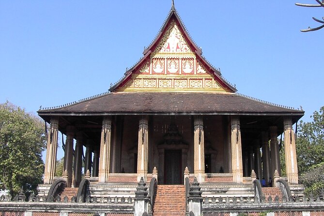 Vientiane City Day Tour and Buddha Park Visit with Lunch | Laos - Pha That Luang and Patuxay: national symbols with different moods